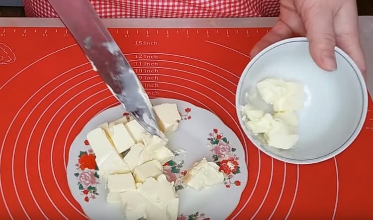 Cut butter into slices.