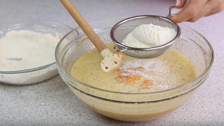 Sift flour into the dough.