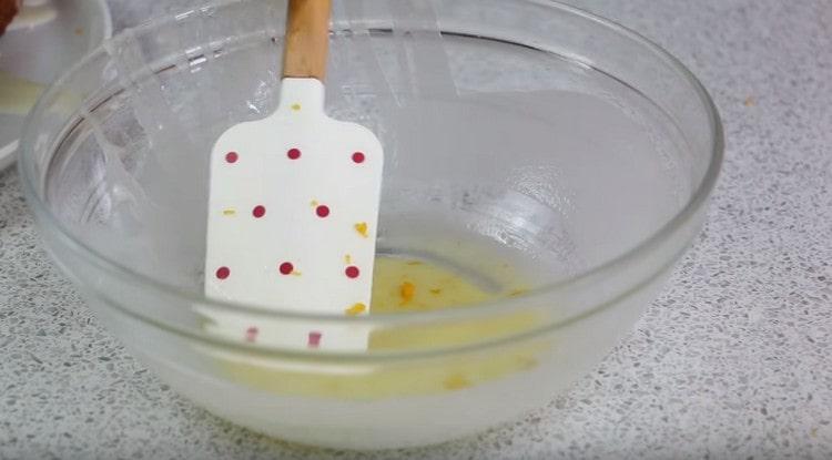 Set aside a few tablespoons of glaze, add a little zest to it so that it turns yellow.