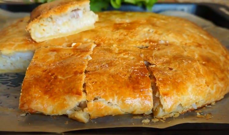 Such a pie with fish and rice is prepared simply, but it turns out very tasty.