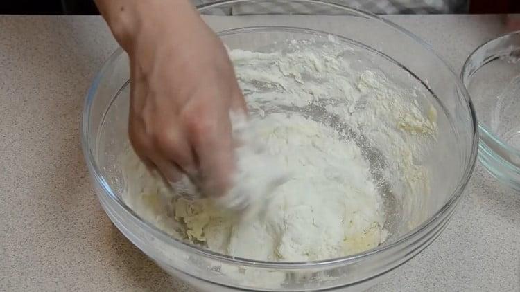 Knead the dough, adding flour if necessary.