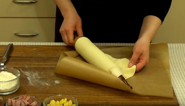 Carefully transfer the workpiece to parchment.