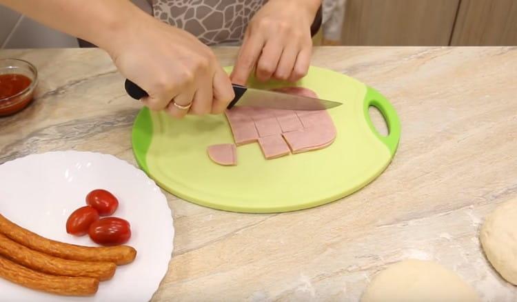 Cut the ham into arbitrary pieces.