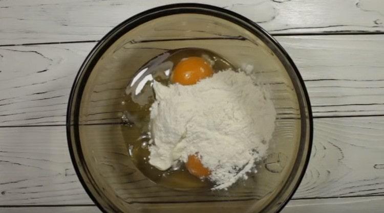 Add salt, sour cream and flour to the eggs.