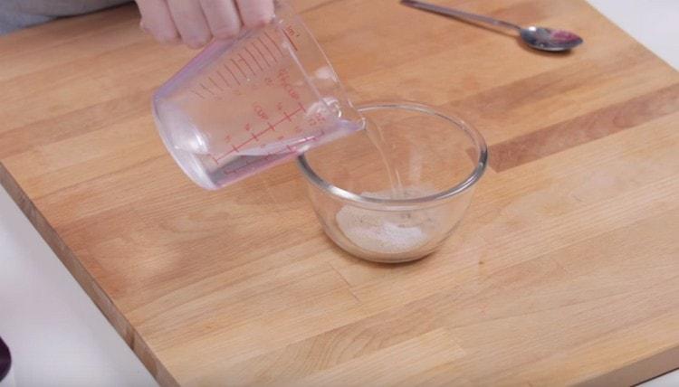 Pour yeast with sugar in warm water.