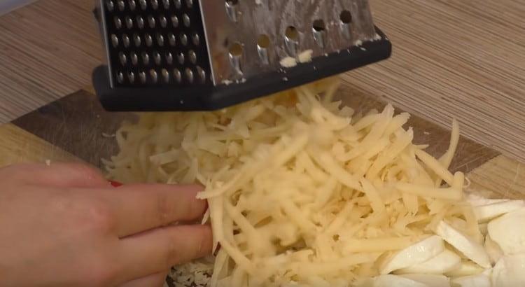 Grate hard cheese.