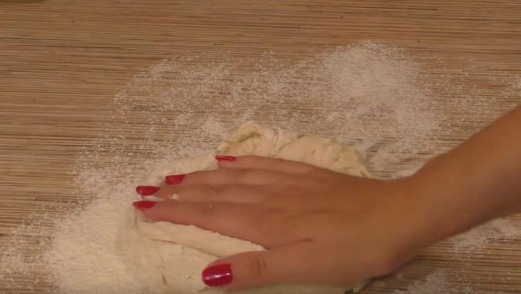 Knead the soft dough.