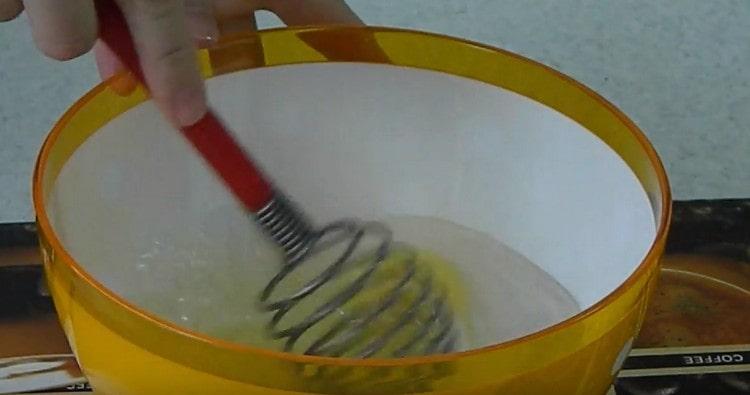 In a bowl, beat the egg with salt and water.