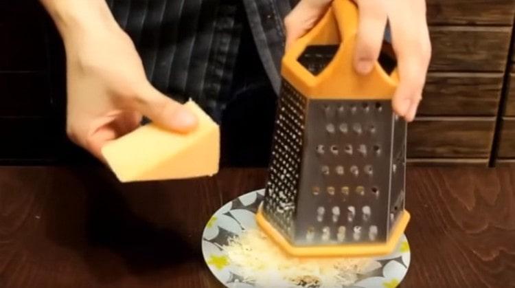 Rub the parmesan on a grater.