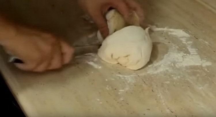 Divide the dough in half.