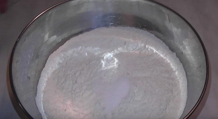 Sift the flour, add salt to it.