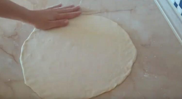 Roll each part of the dough thinly.