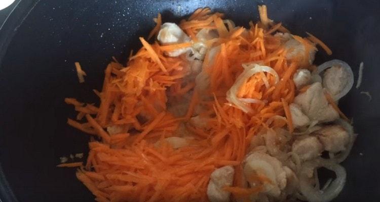 Grate carrots and add to the meat with onions.