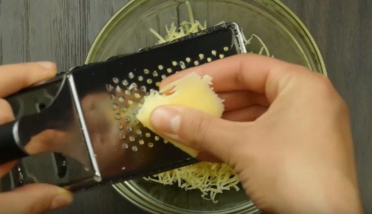 Rub the cheese on a fine grater.