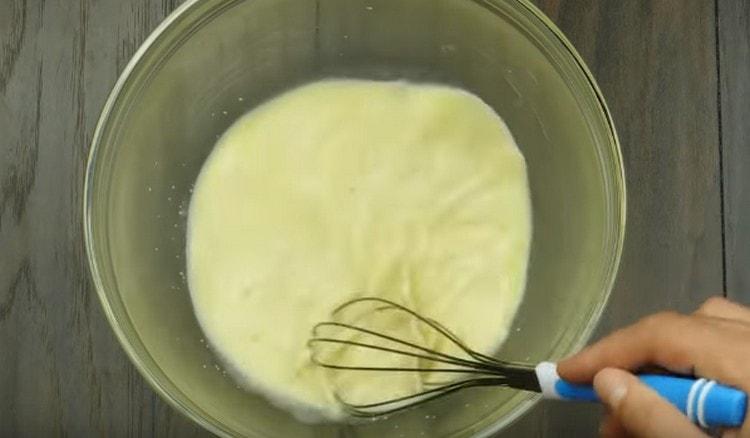 Add one egg and mix everything with a whisk.