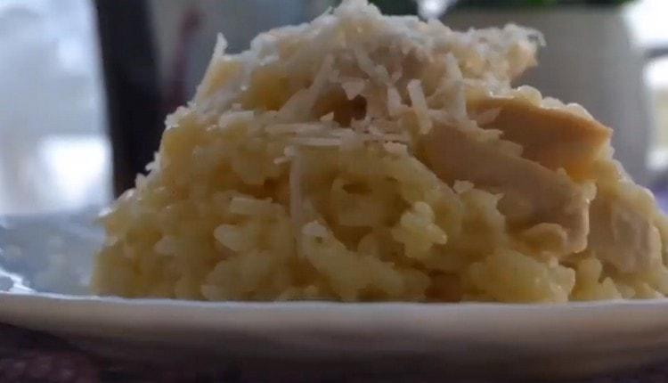 When serving chicken risotto, you can additionally sprinkle grated Parmesan.
