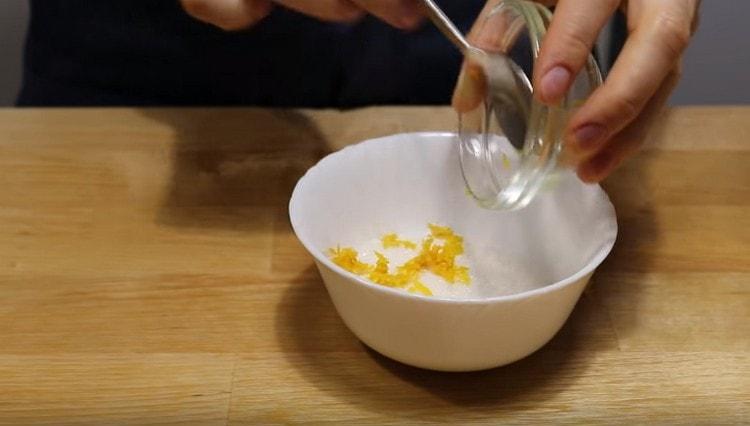 Mix the orange zest with sugar.