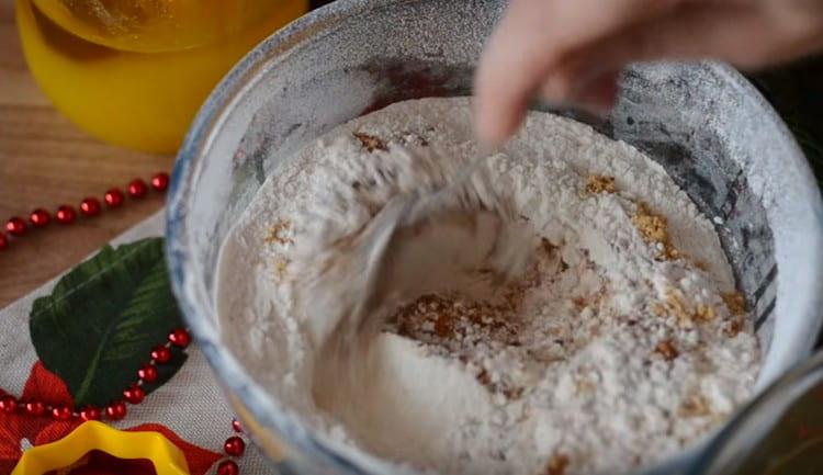 Combine flour with baking powder, cinnamon, nutmeg, ginger.