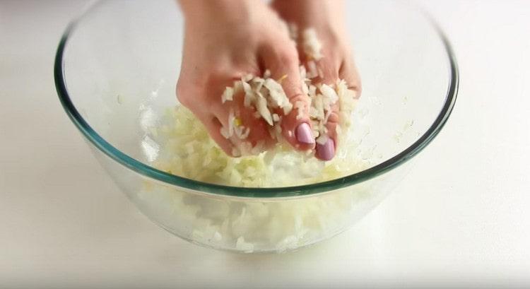 Finely chop the onion and knead it with your hands.