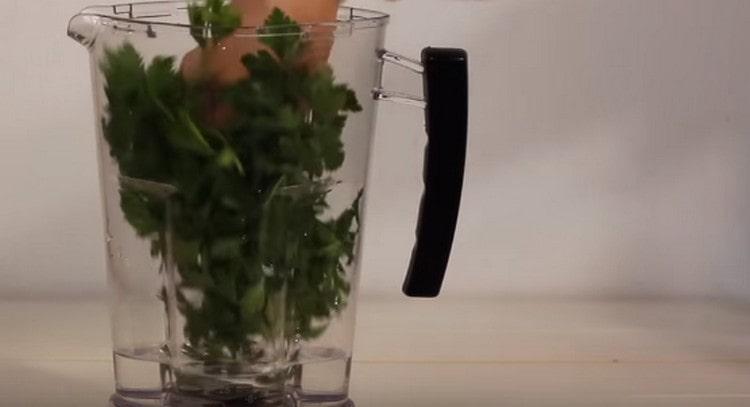 Put parsley in the blender bowl.