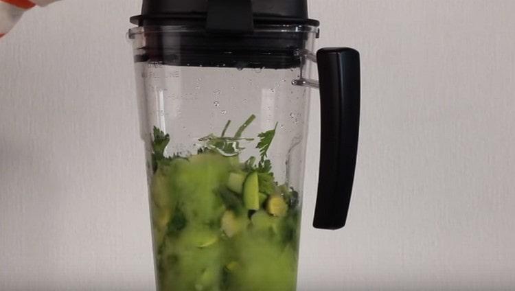 Turn on the blender and cook a smoothie.