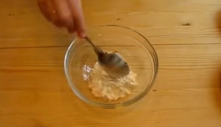 Pour flour into a small bowl.