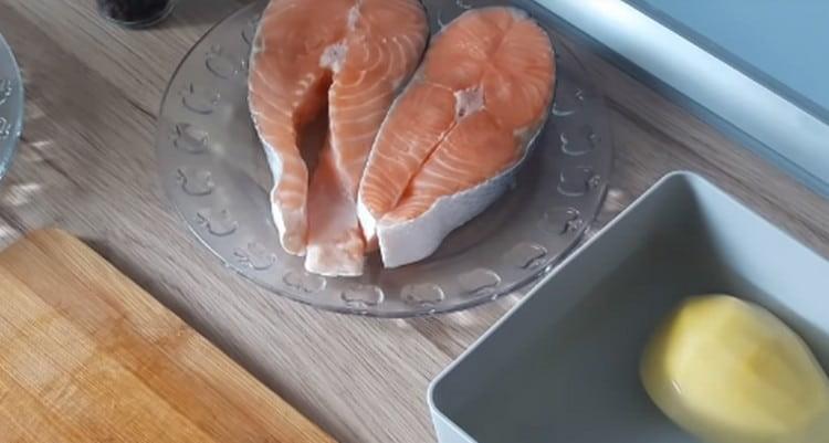 Cut red fish into large steaks.