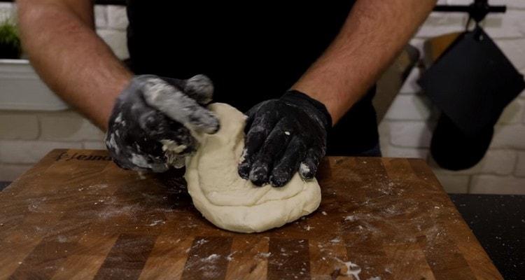 Knead the soft dough.