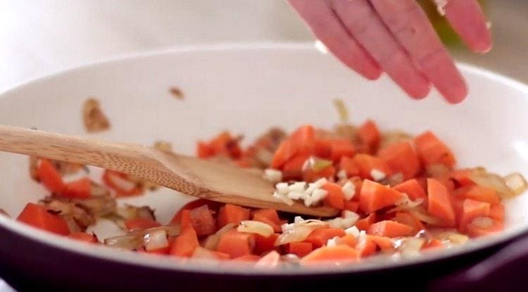 When the frying is almost ready, add chopped garlic.