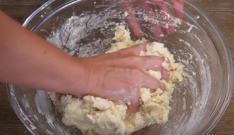 Knead the dough by hand, it should not stick to the hands.