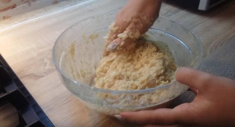 Knead the minced meat, adding salt and pepper to taste to it.