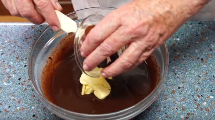 At the end, add butter to the icing and mix well again.