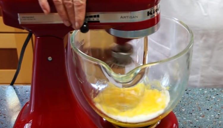 Beat the yolks with a mixer.