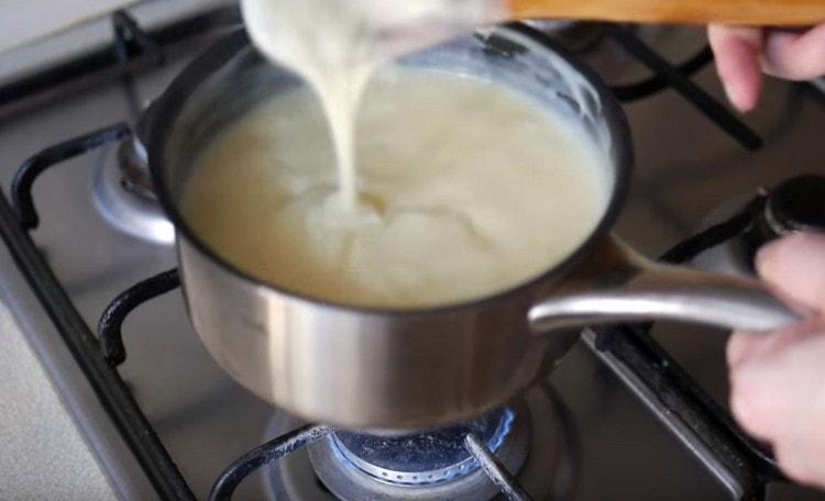 Boil the cream until thickened.