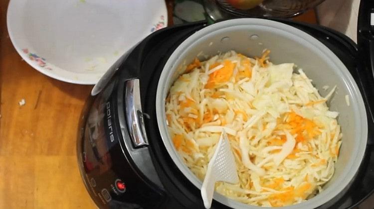 Add chopped cabbage to the slow cooker.