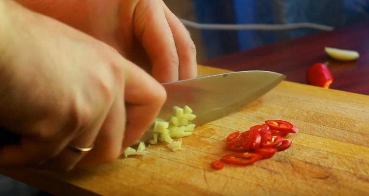 We also chop the garlic.