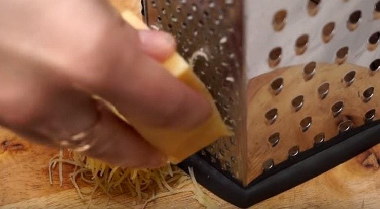 Grate the cheese. while the fish is baked.