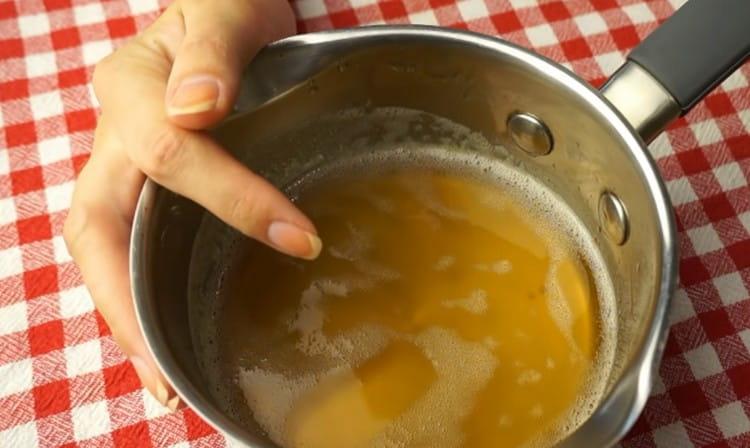 Pour boiling water over gelatin. so that it swells.