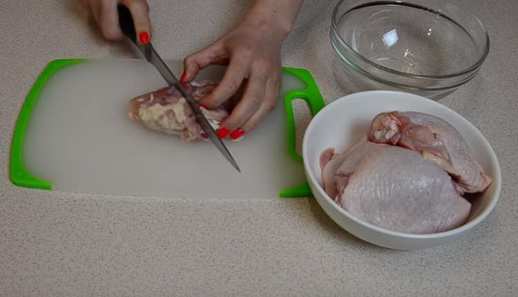 Wash my chicken thighs and cut into 2 parts each.