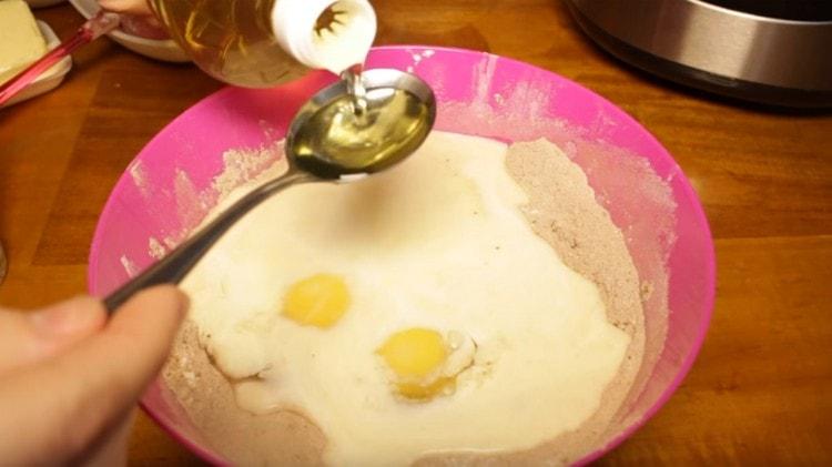 We introduce eggs, vinegar to the dry components, mix.