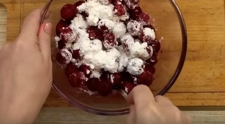 Mix cherries with icing sugar so that they let the juice go.