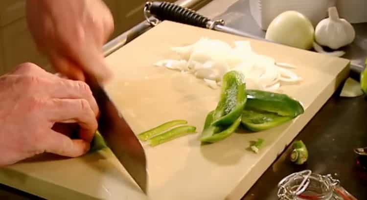 To cook chicken beef stroganoff, chop the vegetables