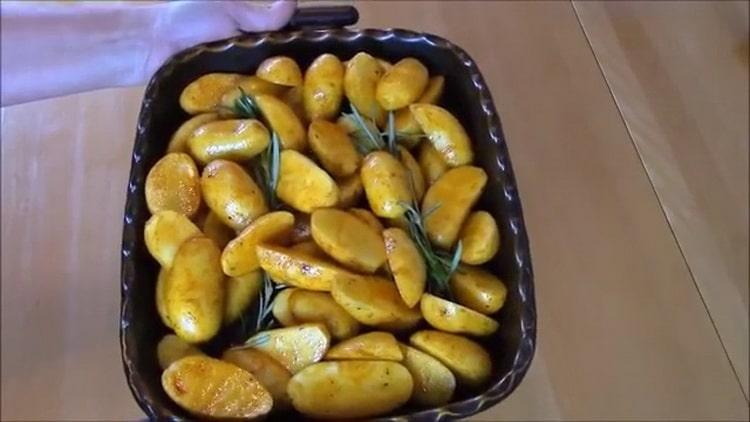 To make dorado in the oven, add herbs to the potatoes
