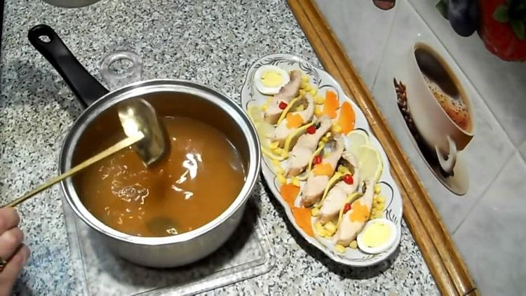 To make jellied fish, fill the ingredients with broth
