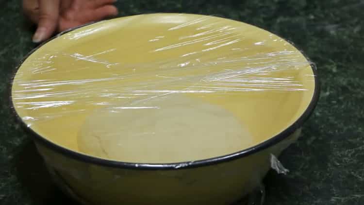 For the preparation of Italian pizza. put the dough under the film