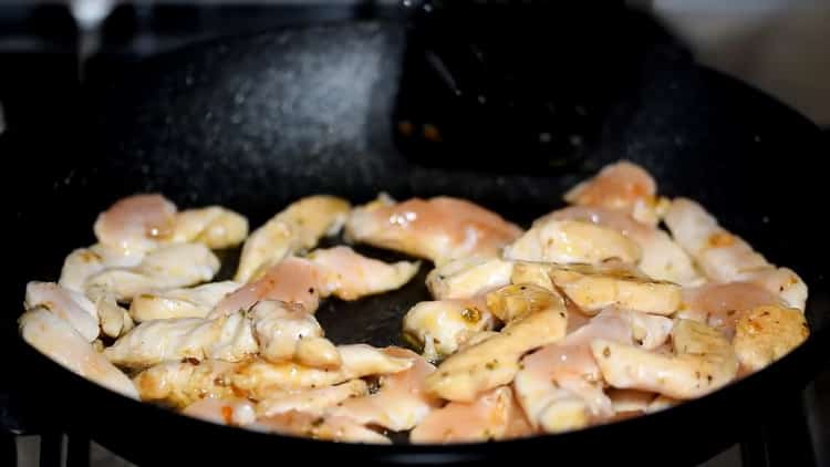 To cook chicken quesadillas, fry the meat