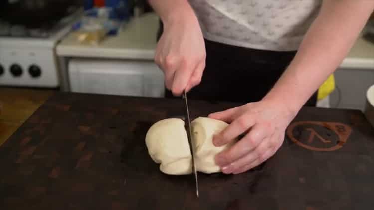 To make a classic pizza, split the dough