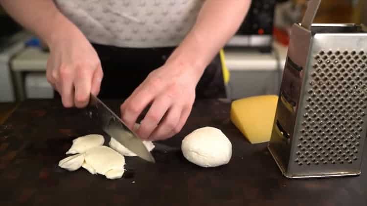 To make a classic pizza, chop the mozzarella