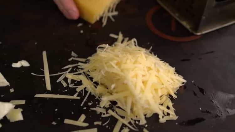 To make classic pizza, grate cheese