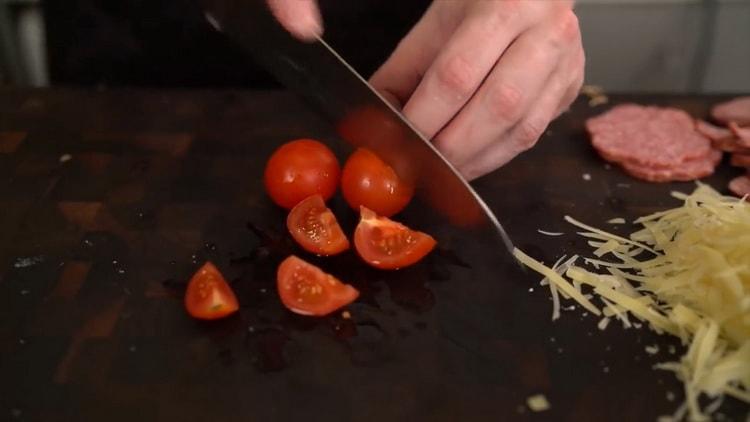 To make a classic pizza, chop the tomatoes
